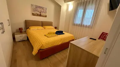 Letto o letti in una camera di Casa vacanze Il Mandarancio