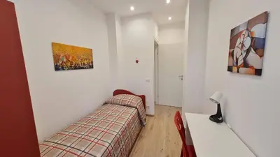 Letto o letti in una camera di Casa vacanze Il Mandarancio