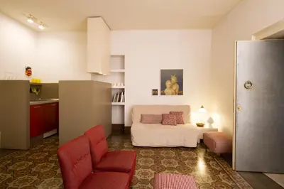 Letto o letti in una camera di Tre Vie apARTment con terrazza