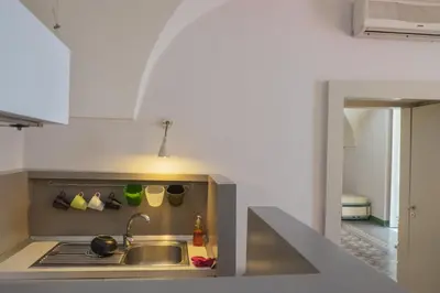Cucina o angolo cottura di Tre Vie apARTment con terrazza