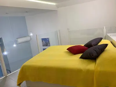 Letto o letti in una camera di The Painting