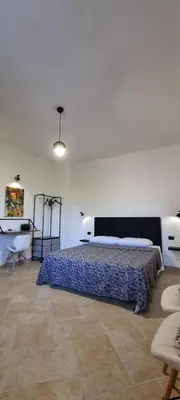 Letto o letti in una camera di House of Flowers