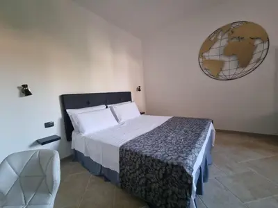 Letto o letti in una camera di House of Flowers