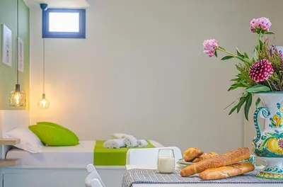 Letto o letti in una camera di Sunrise Luxury Apartments