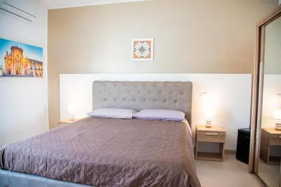 Letto o letti in una camera di A & G RELAX ROOMS