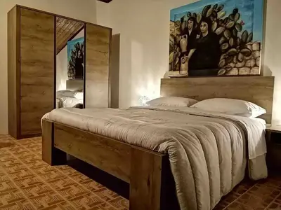 Letto o letti in una camera di Mary Home Sicily