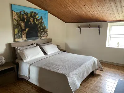 Letto o letti in una camera di Mary Home Sicily