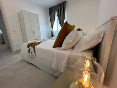 Letto o letti in una camera di Villetta Kennedy a 20 mt dal Mare