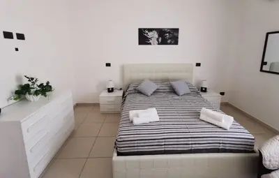 Letto o letti in una camera di Casa Landolina Noto