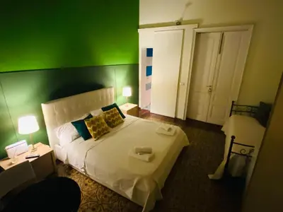 Letto o letti in una camera di Al Castello