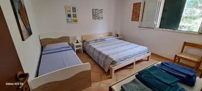 Letto o letti in una camera di CasaSicula - Artemis House