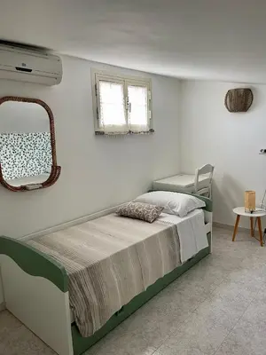 Letto o letti in una camera di Villa Patty
