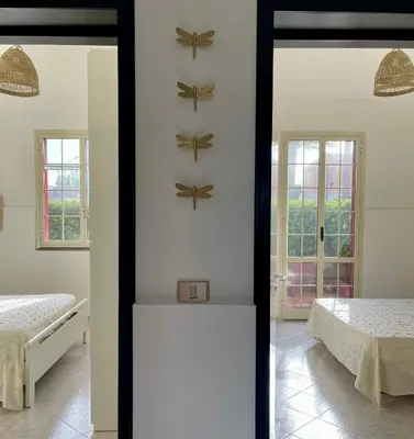 Letto o letti in una camera di Villa Patty