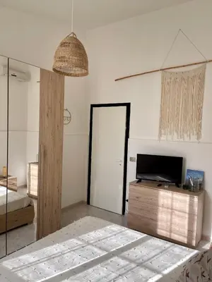 Letto o letti in una camera di Villa Patty