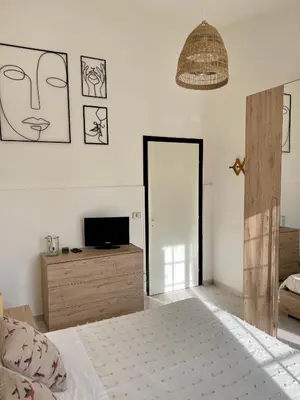 Letto o letti in una camera di Villa Patty