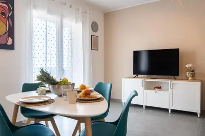 TV o dispositivi per l'intrattenimento presso Imama' apartament vista mare