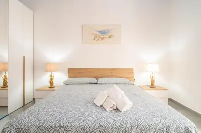 Letto o letti in una camera di Imama' apartament vista mare