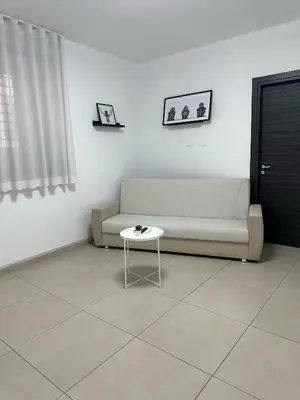 Area soggiorno di La Claudette Apartment Catania