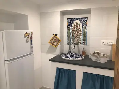 Cucina o angolo cottura di IL VICOLETTO Luxury Apartments