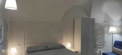 Letto o letti in una camera di Dietro il Teatro casa confortevole in pieno centro