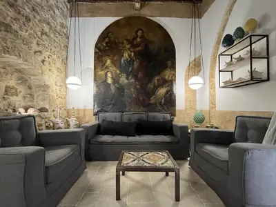 Area soggiorno di VERMEXIO SUITE
