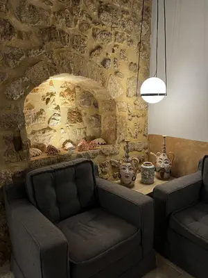 Area soggiorno di VERMEXIO SUITE