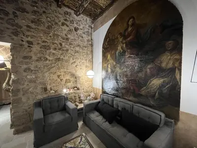 Area soggiorno di VERMEXIO SUITE