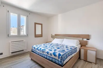 Letto o letti in una camera di Aquamarine Terrace by Wonderful Italy