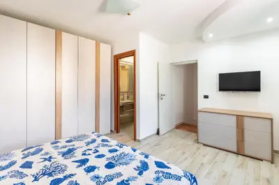 Letto o letti in una camera di Aquamarine Terrace by Wonderful Italy