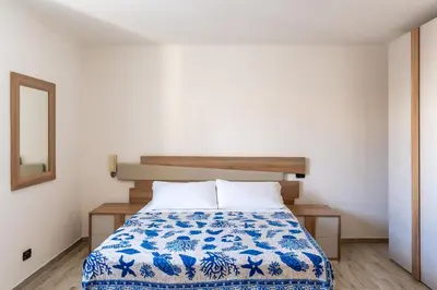 Letto o letti in una camera di Aquamarine Terrace by Wonderful Italy