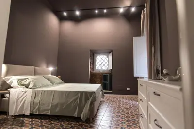 Letto o letti in una camera di il sacrato di casa loreto