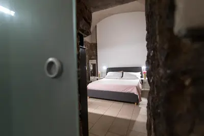 Letto o letti in una camera di il sacrato di casa loreto