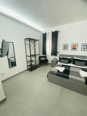 Letto o letti in una camera di Sicilian Rooms