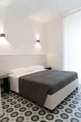 Letto o letti in una camera di Zagara e Lumia