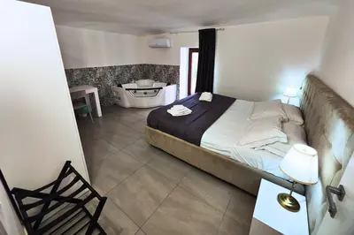 Letto o letti in una camera di Home De Curtis