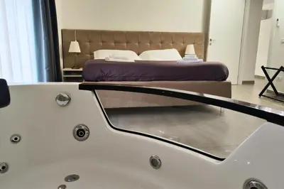 Letto o letti in una camera di Home De Curtis