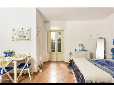 Letto o letti in una camera di La casetta di Diana Ortigia