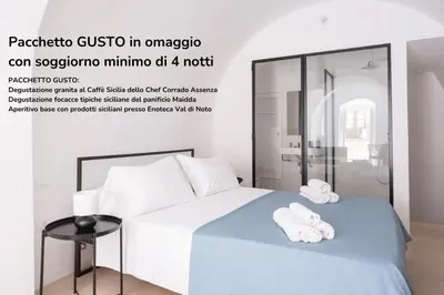 Letto o letti in una camera di I 5 Archi di Via Ducezio