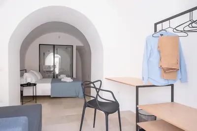 Letto o letti in una camera di I 5 Archi di Via Ducezio