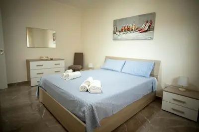 Letto o letti in una camera di DaniPa House