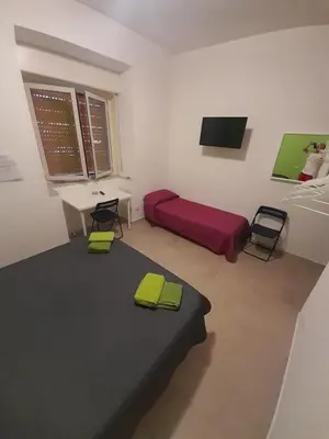 Letto o letti in una camera di CTA Catania Aeroporto fontanarossa