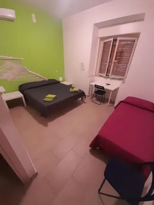 Letto o letti in una camera di CTA Catania Aeroporto fontanarossa