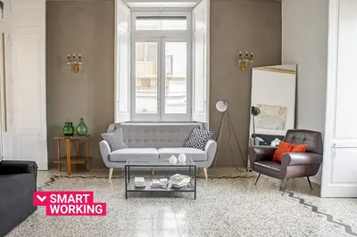 Area soggiorno di Cavour Apartments by Wonderful Italy