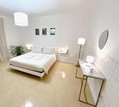 Letto o letti in una camera di VILLA GIUDICE Luxury Home