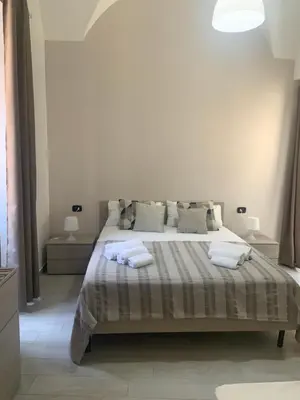 Letto o letti in una camera di Vittorio Emanuele house