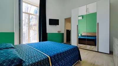 Letto o letti in una camera di DUHOME apartment in the heart of Catania
