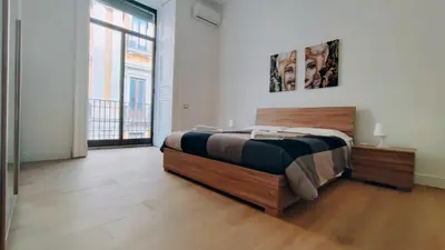 Letto o letti in una camera di DUHOME apartment in the heart of Catania