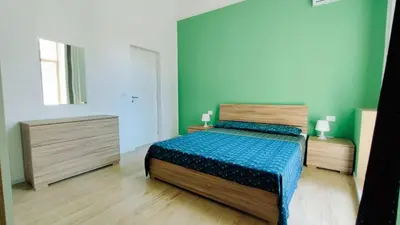 Letto o letti in una camera di DUHOME apartment in the heart of Catania