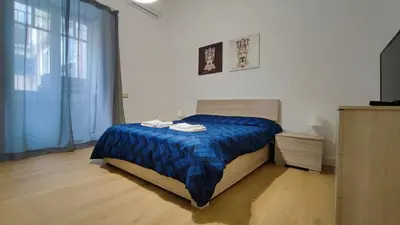 Letto o letti in una camera di DUHOME apartment in the heart of Catania