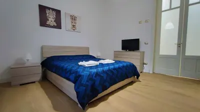 Letto o letti in una camera di DUHOME apartment in the heart of Catania